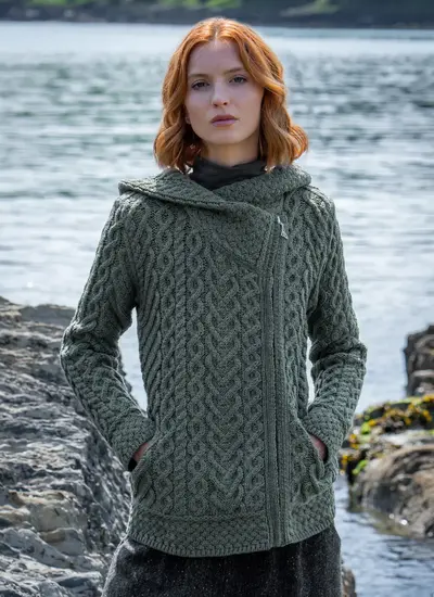 red head model at seaside in tundra aran cable knit biker hoodie front